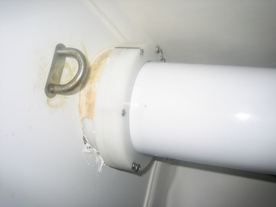 J105 inside seal connected to the aft face of the aft Delrin bushing
